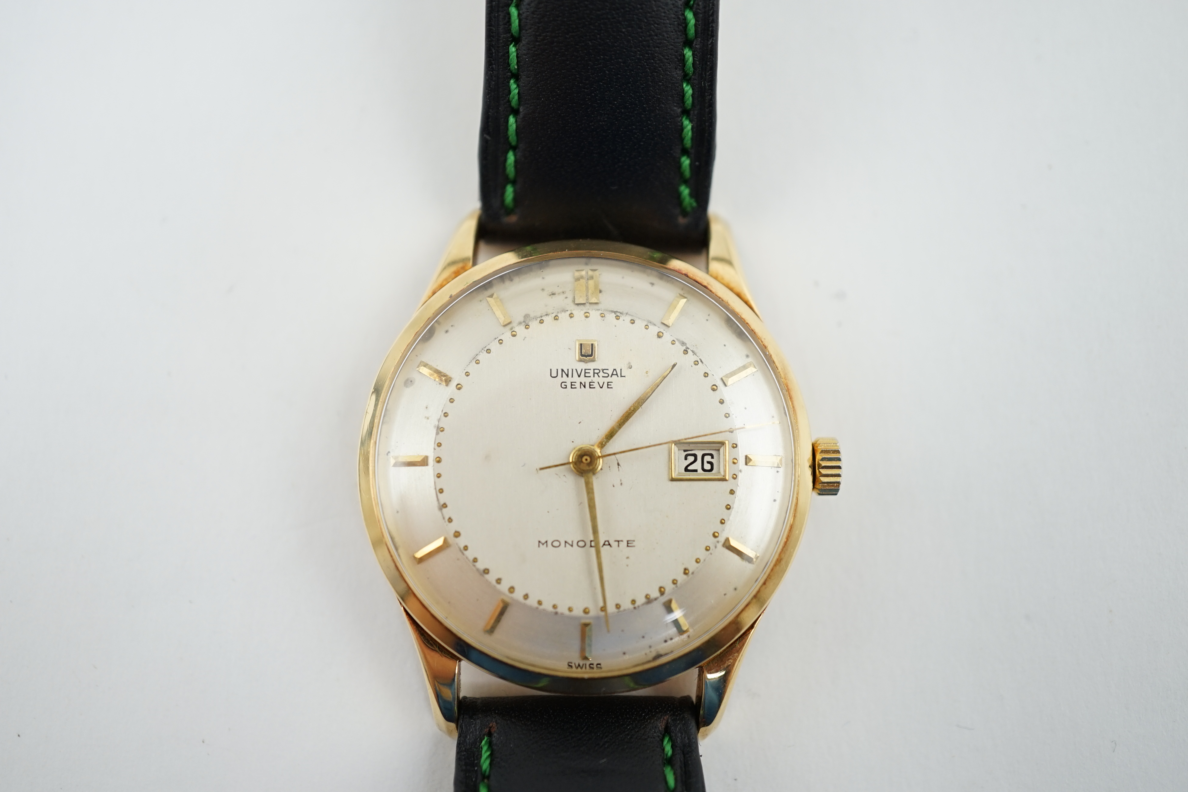 A gentleman's 1950's 18k gold Universal Monodate manual wind wrist watch